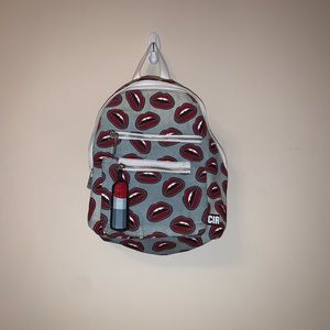 Denim lip backpack